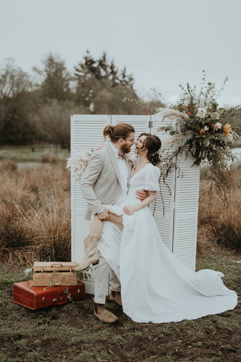 Farm Wedding Cowboy booted bride