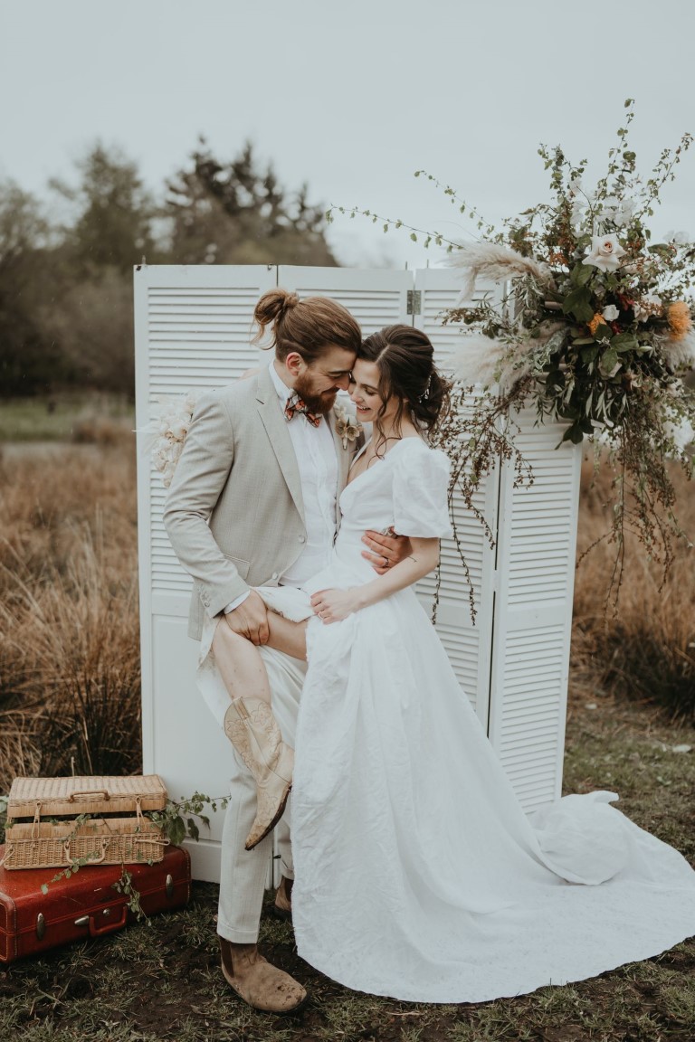 Ceremony backdrop of vintage white door on Vancouver Island