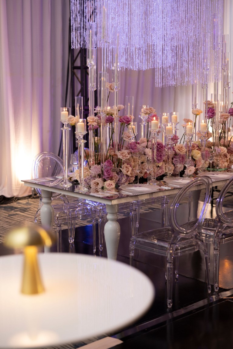 Floral display on table at Luxe Wedding Show 2024
