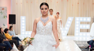 bride in white strapless gown walks down runway at Swank Show Vancouver