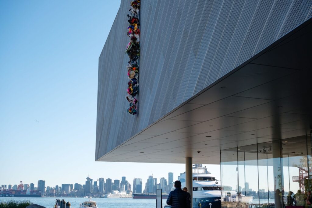 Polygon Gallery view across Vancouver ocean with large yacht
