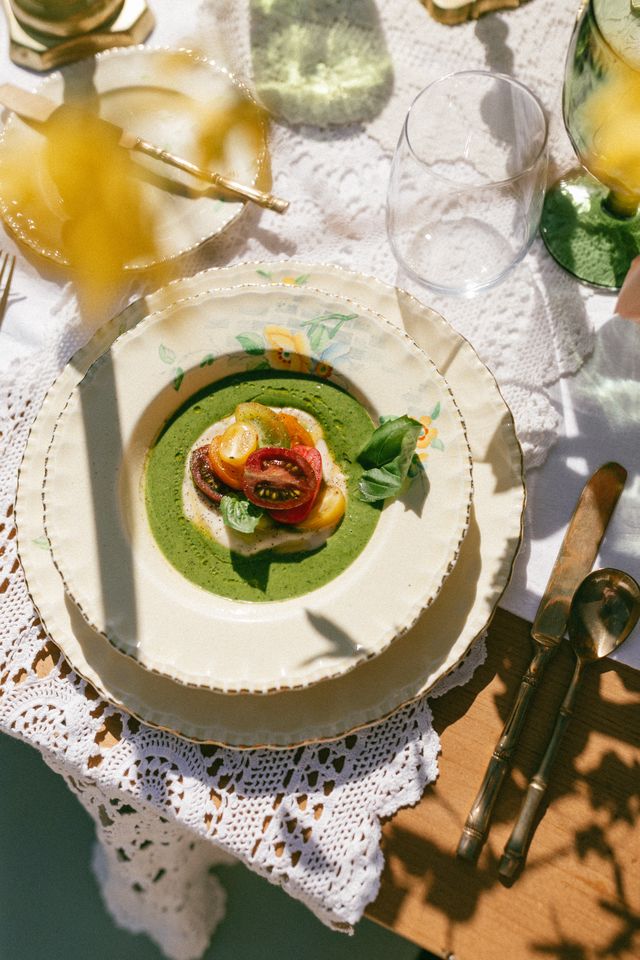 soup with fresh sliced tomatoes garnish