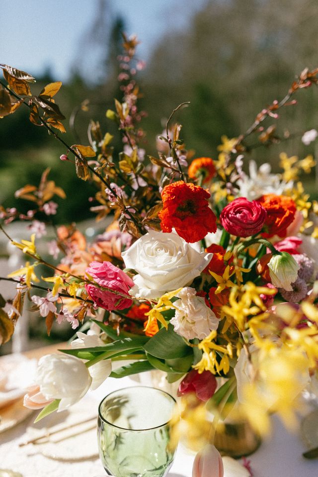 vibrant coloured florals adorn table