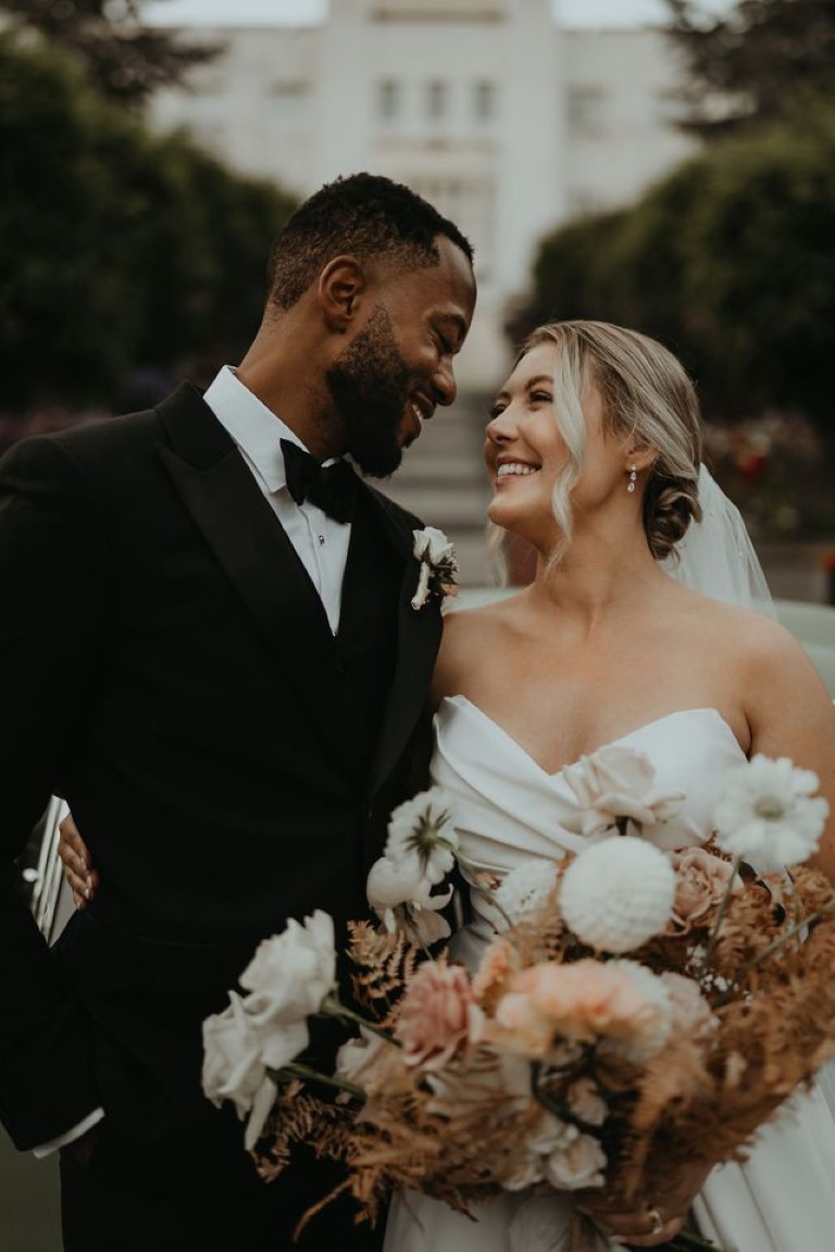 bride and groom share intimate moment