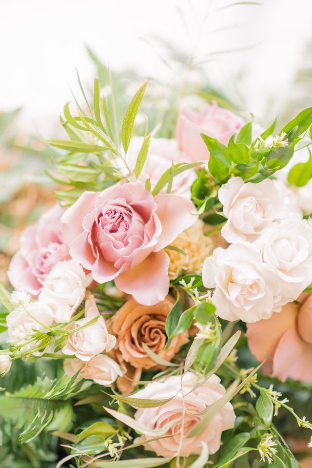 pale pink and neutral roses and greenery wedding florals