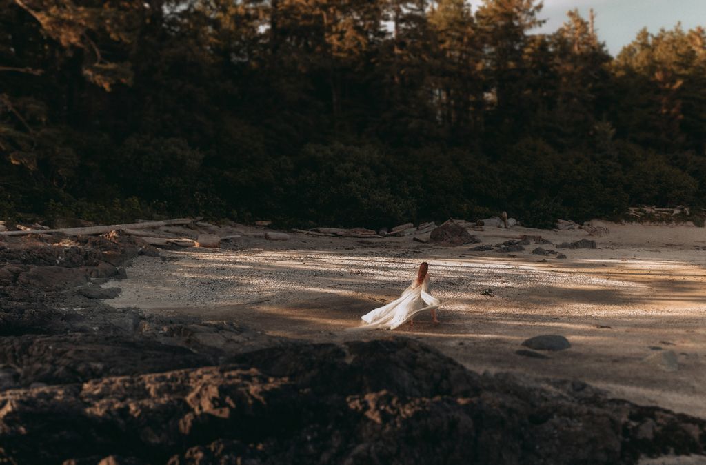 bride runs on the beach