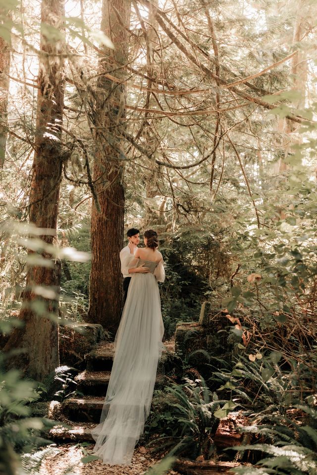 bride and groom on wooden steps