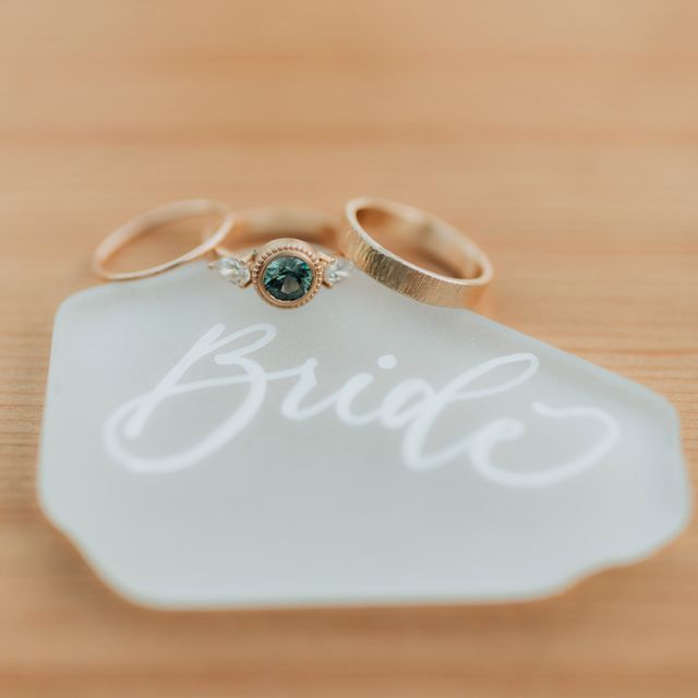 bride written on inside of shell with rings