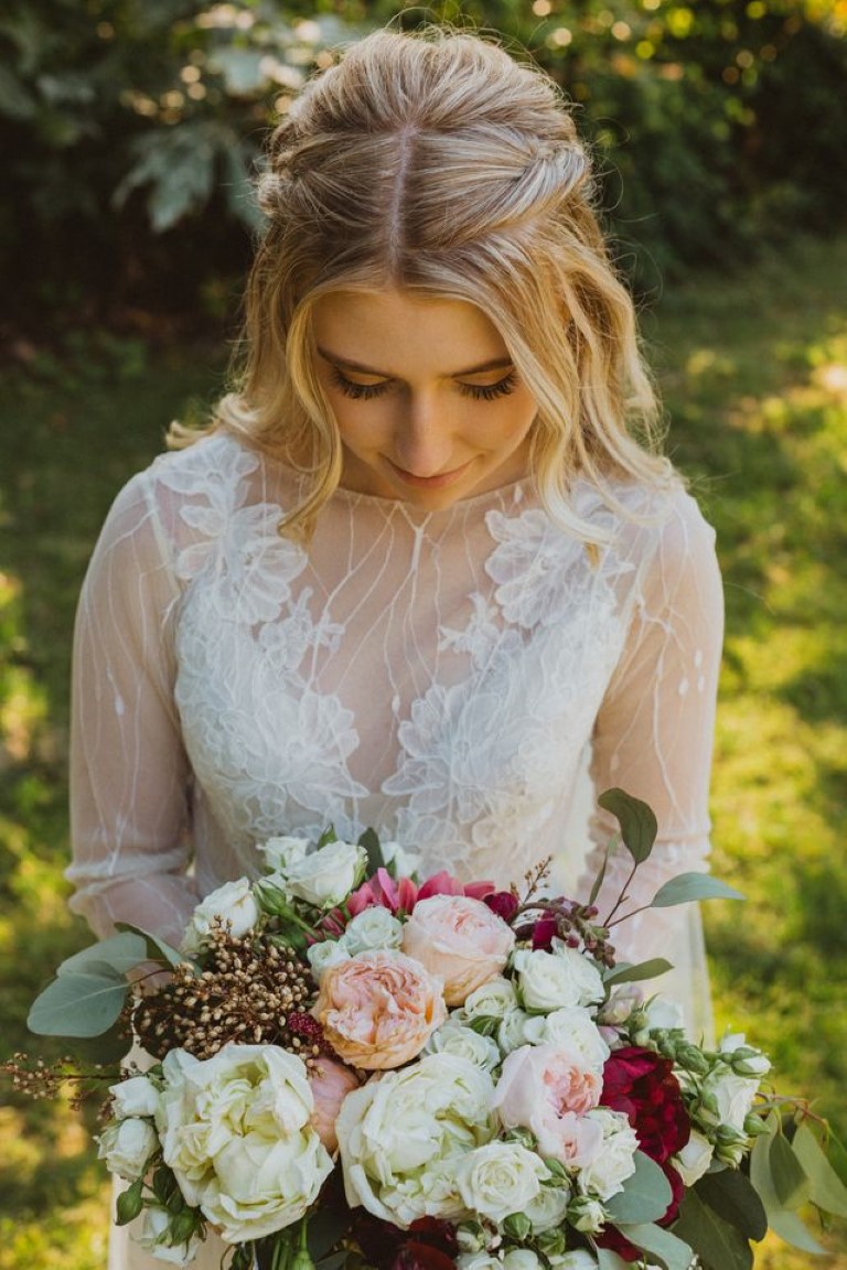 bride holds her bouquet by West Coast Floral Design on Vancouver Island