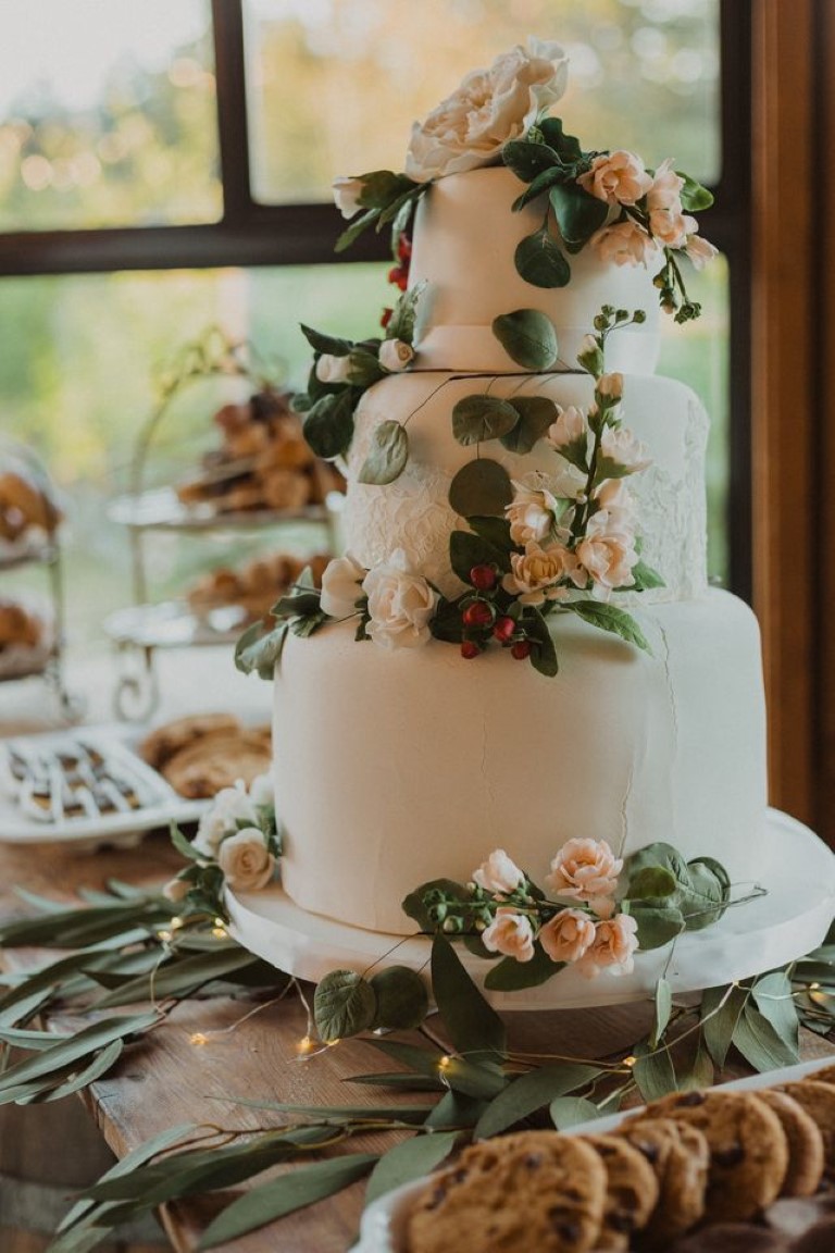 3 tier wedding cake with fresh peach rose florals & cookies