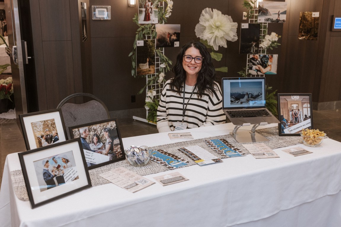 Young Hip and Married officiant smiles at West Coast Weddings Show Vancouver