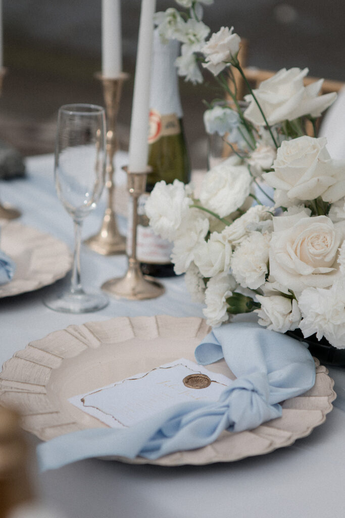 light blue and white reception table with white roses by Divine Decor Vancouver