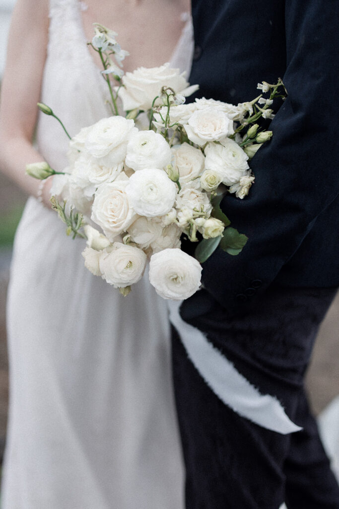 Bridal bouquet of white roses by Divine Decor Vancouver