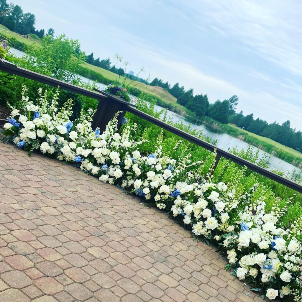 Semi circle of white floral for ourdoor ceremony in Vancouver PROLINE