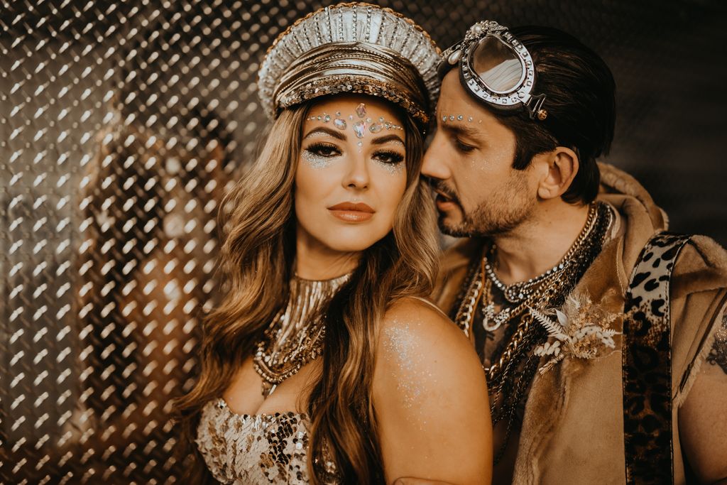 Bride wears pilot cap and groom wears pilot goggles