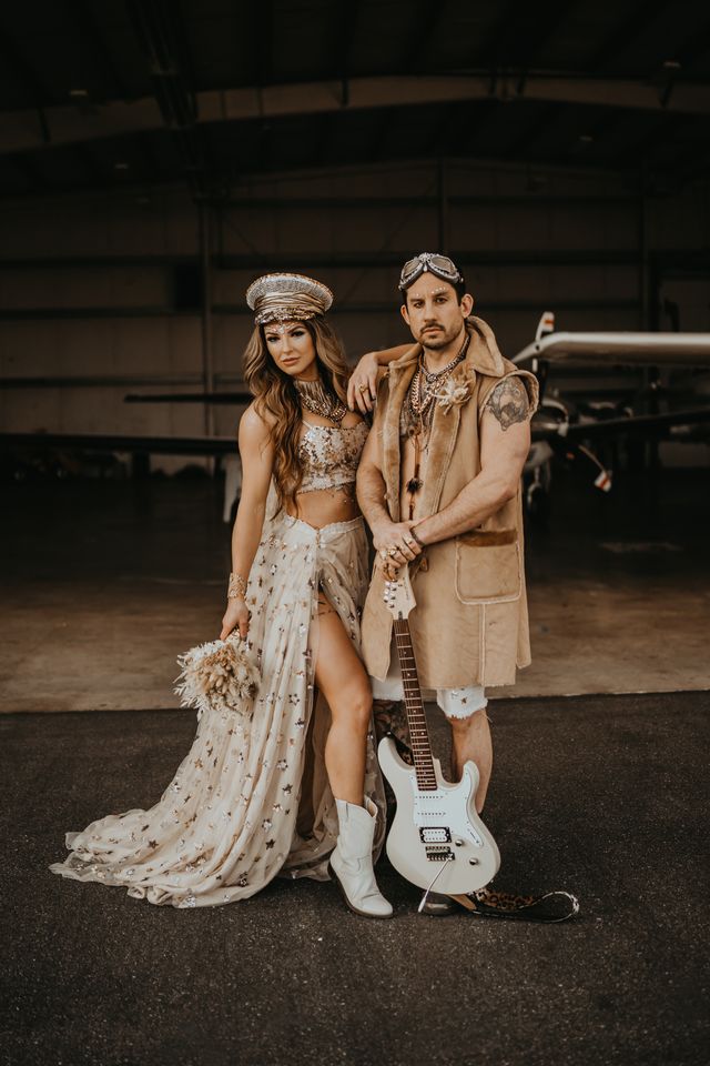 Glam rock wedding in gold at airport elopement