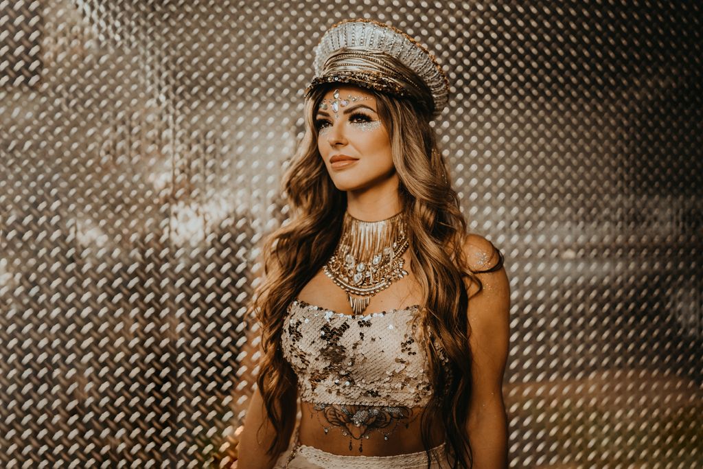 Runaway Romance bride in gold glam rock gown and pilot cap