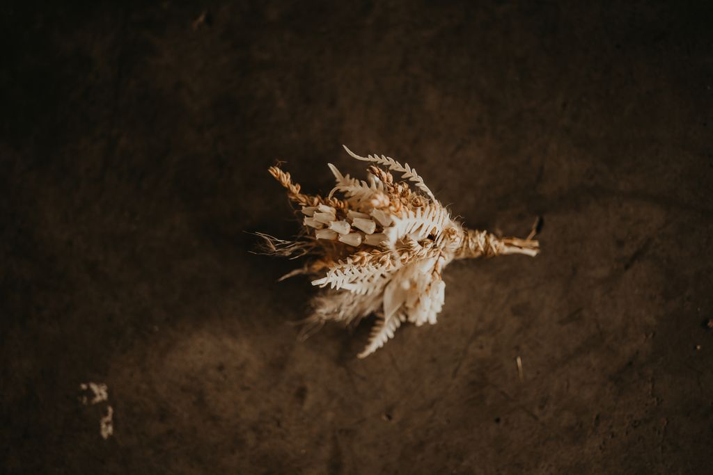 Groom boutonniere with gold touches by Fleurtacious