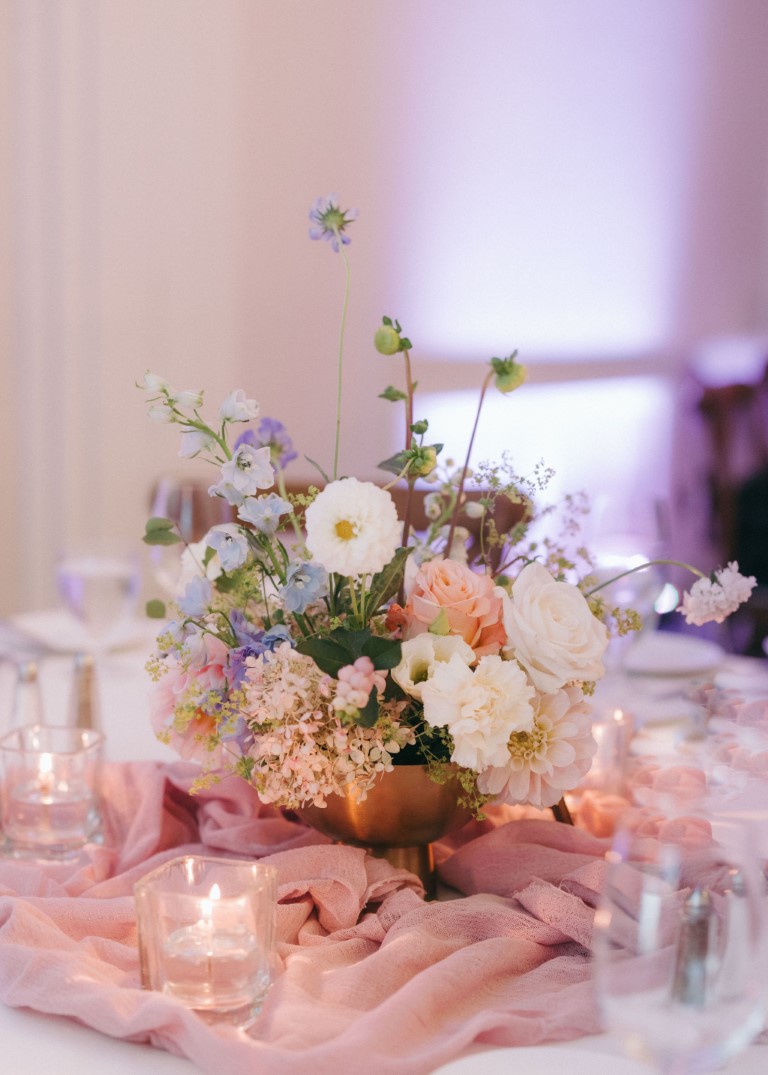 Peach, white and blue reception table floral arrangement by Thorn and Thistle Victoria