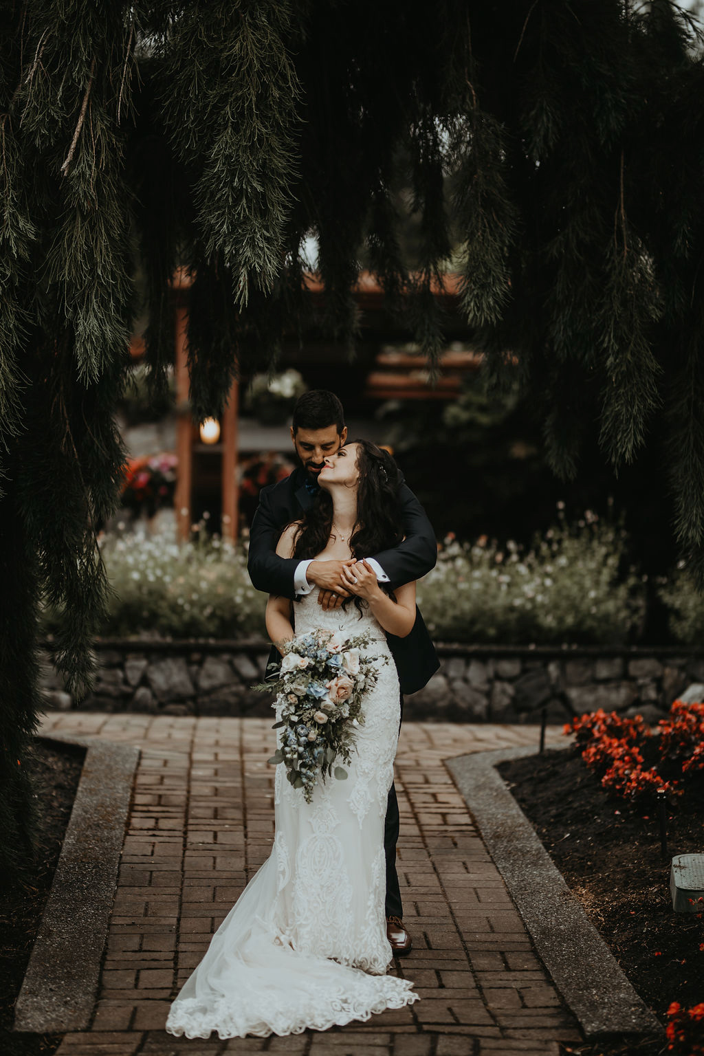 Bride and Groom embrace by Rivkah Photography