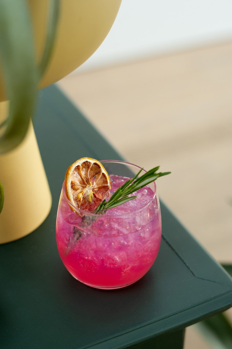 pink cocktail with basil by Lavish Liquid Vancouver