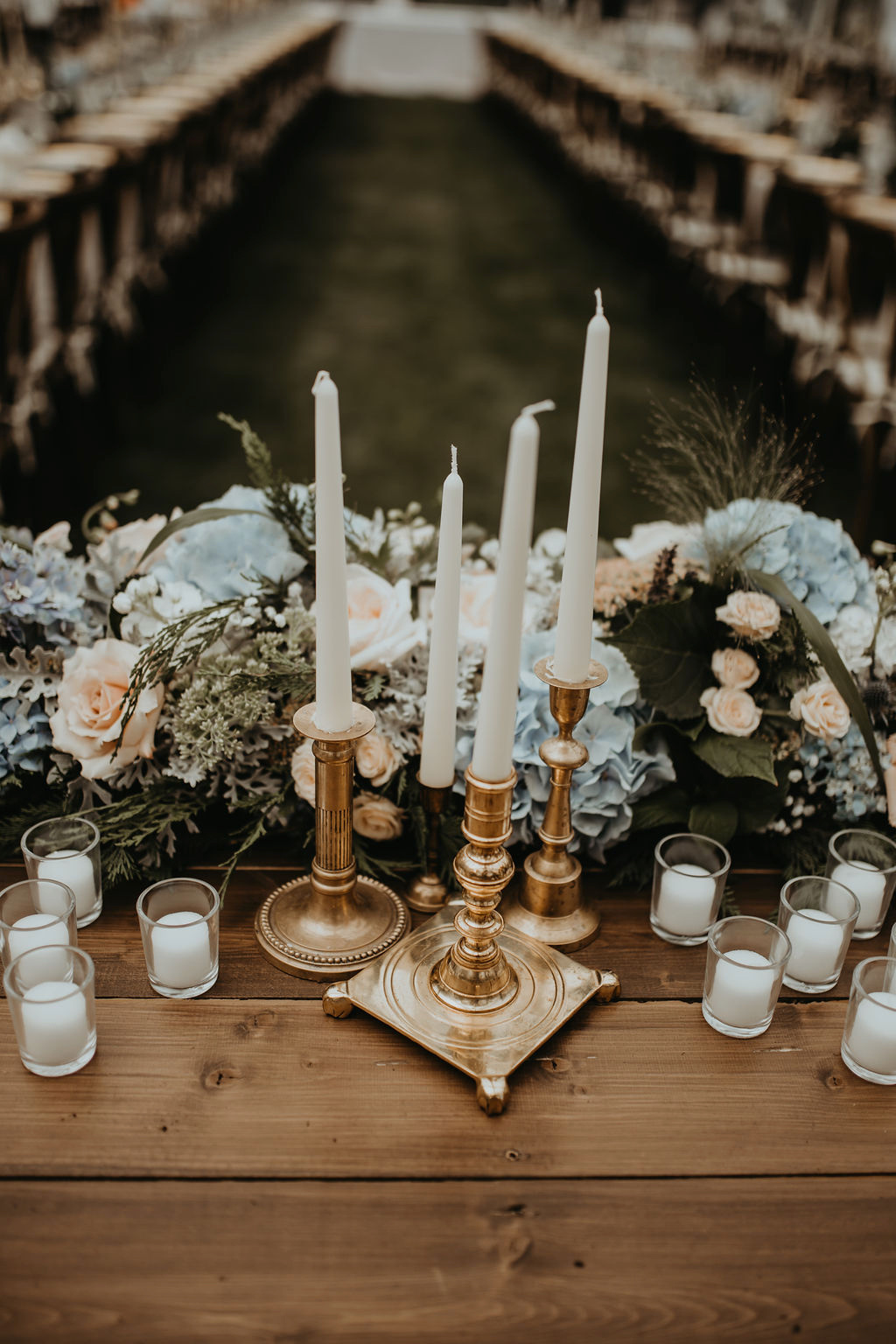 Gold candlesticks on reception table by Rvkah Photo