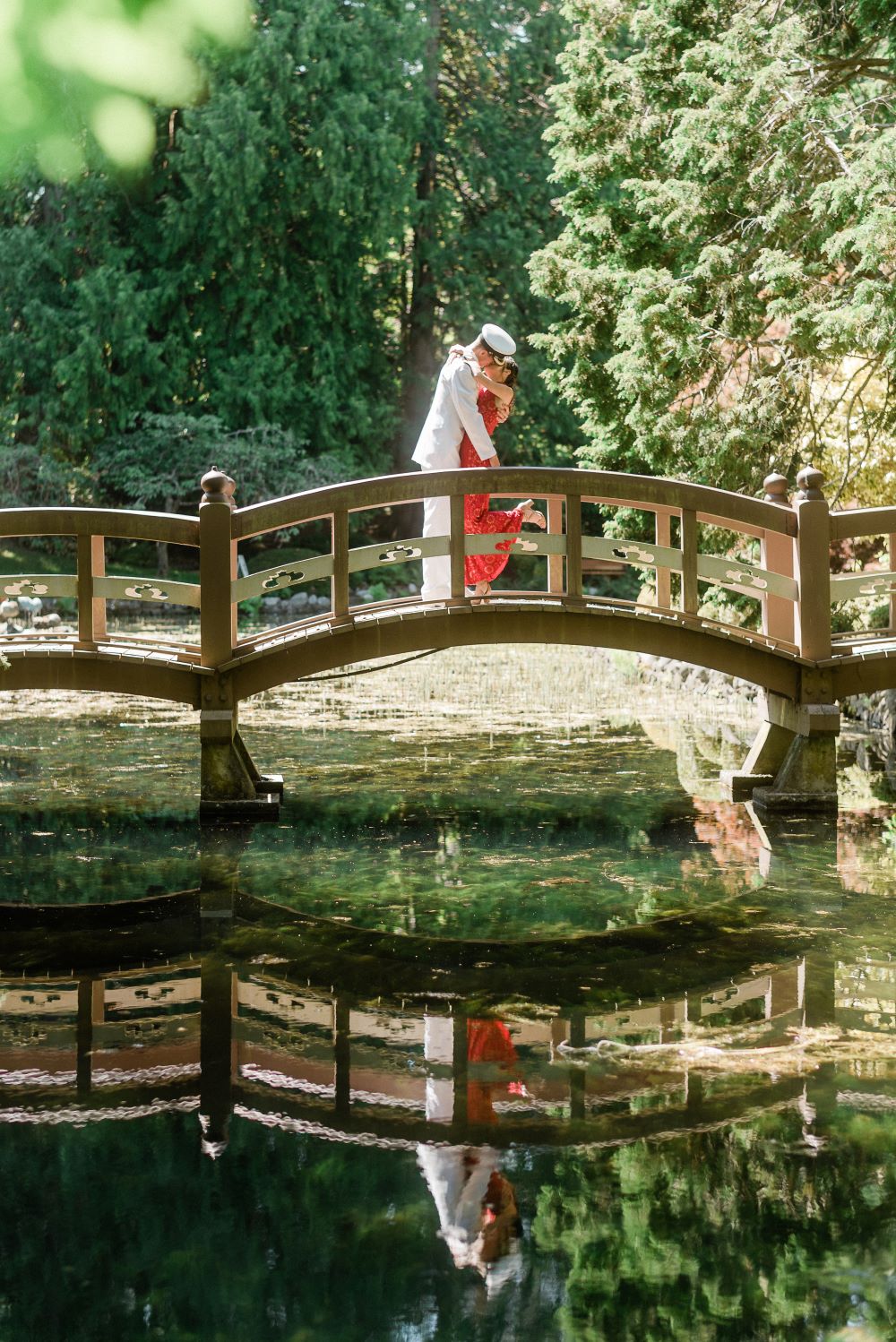 Newlyweds on Hatley Castle bridge