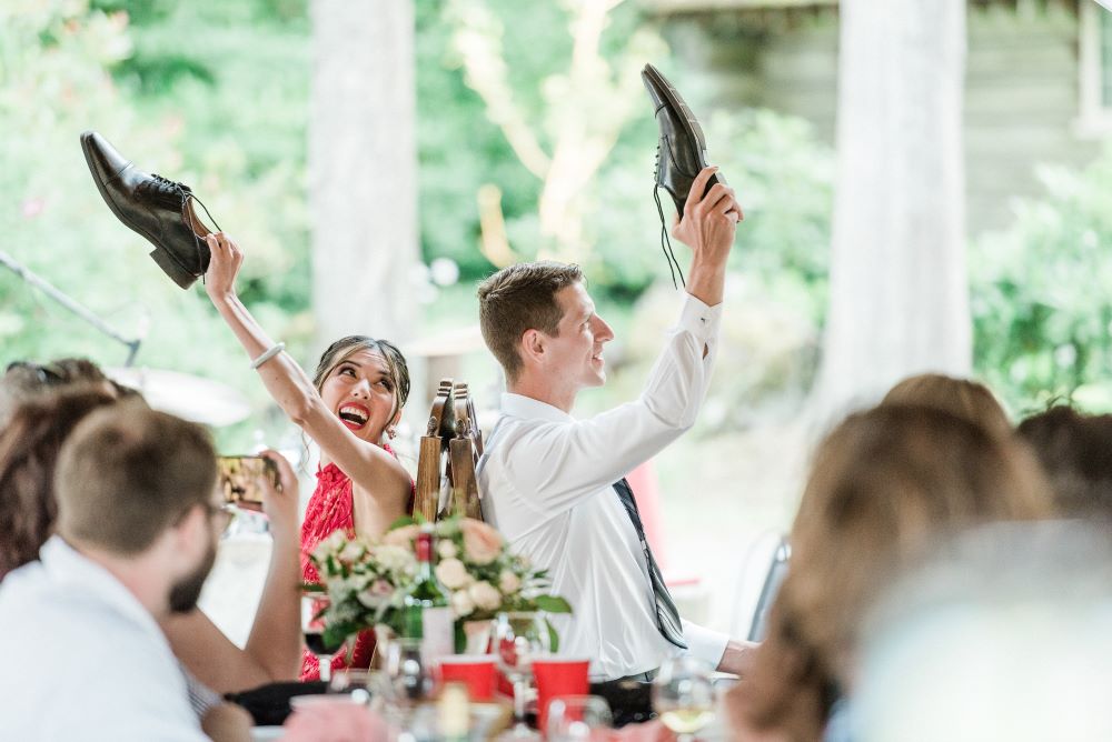 Newlyweds play shoe game at Heritage Acres