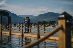 LGBTQ grooms on wood deck by Joelsview Photo