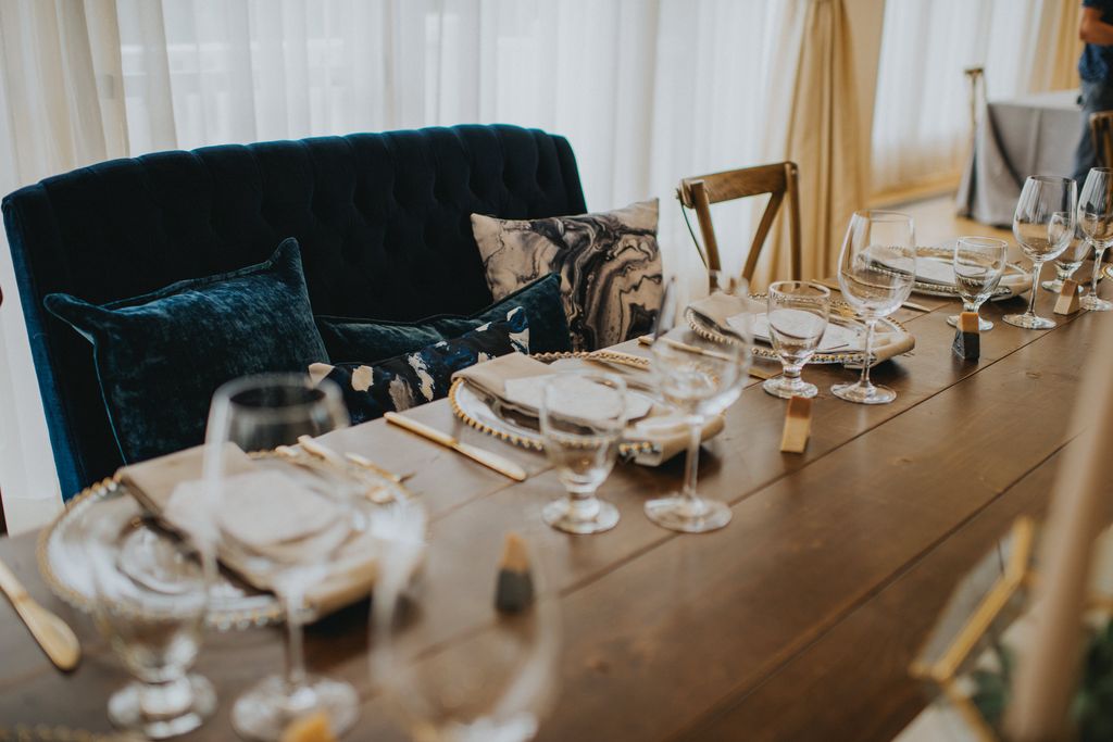 Head table with blue chairs at Hotel Eldorado Kelowna