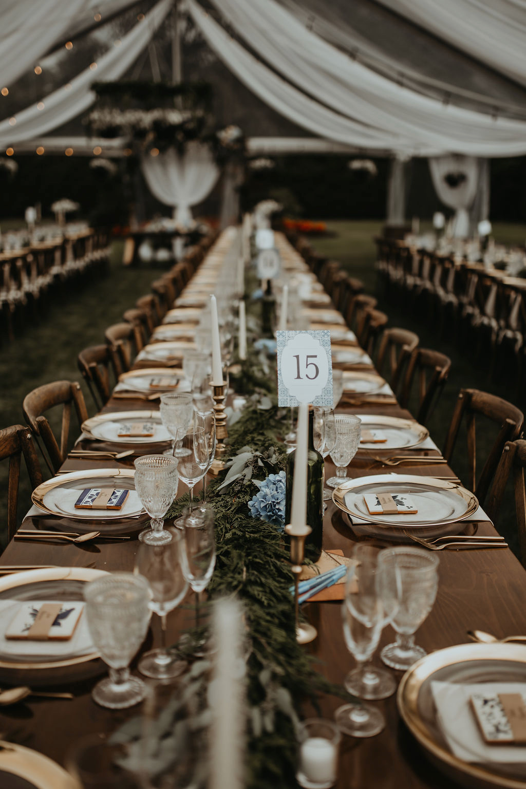 Long wedding tables with place settings by Rivkah Photo