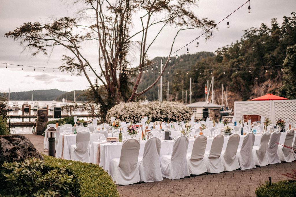 outdoor wedding ceremony set up on deck at Poet's Cove Resort