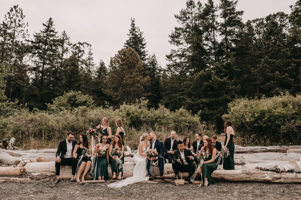 Wedding group shot on Poet's Cove Resort beach