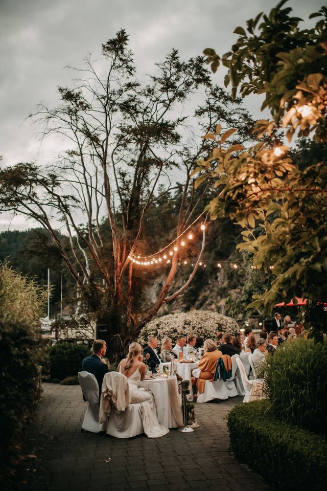 lights over reception dinner on Poet's Cove deck