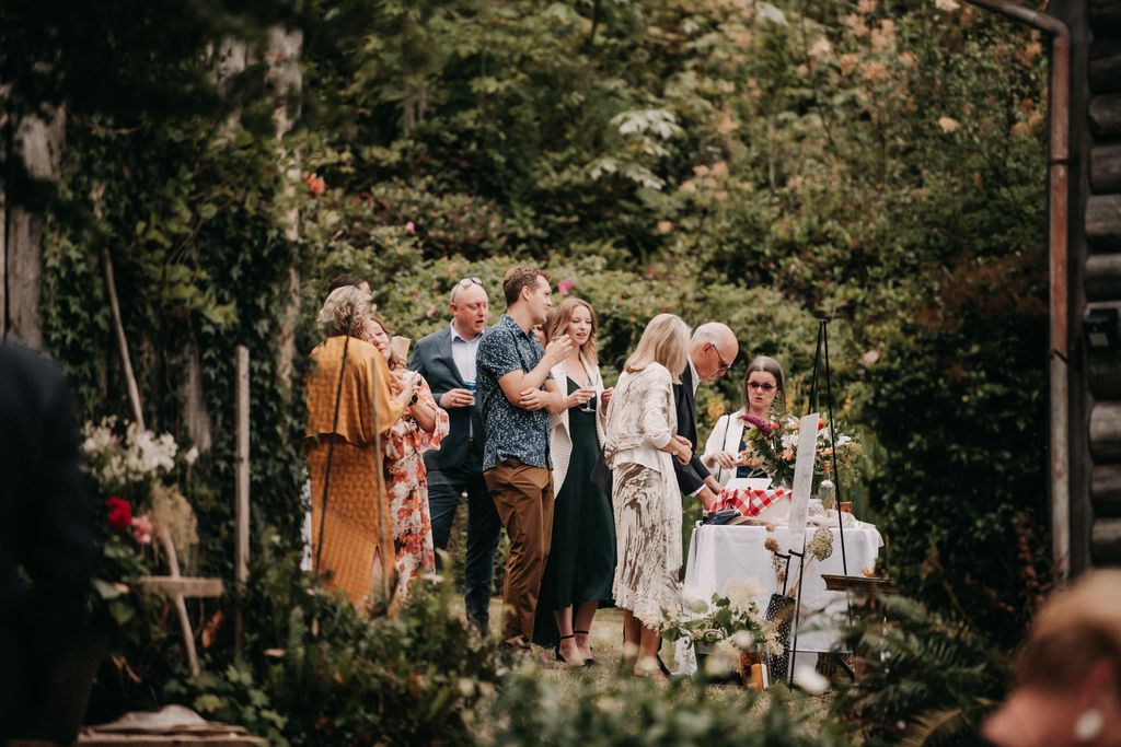 Guests drink champagne after ceremony on Pender Island