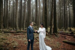 Bride and Groom in BC forest by Kassy Davis