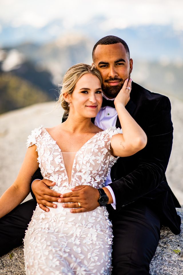 Bride and groom pose by Esther Moerman