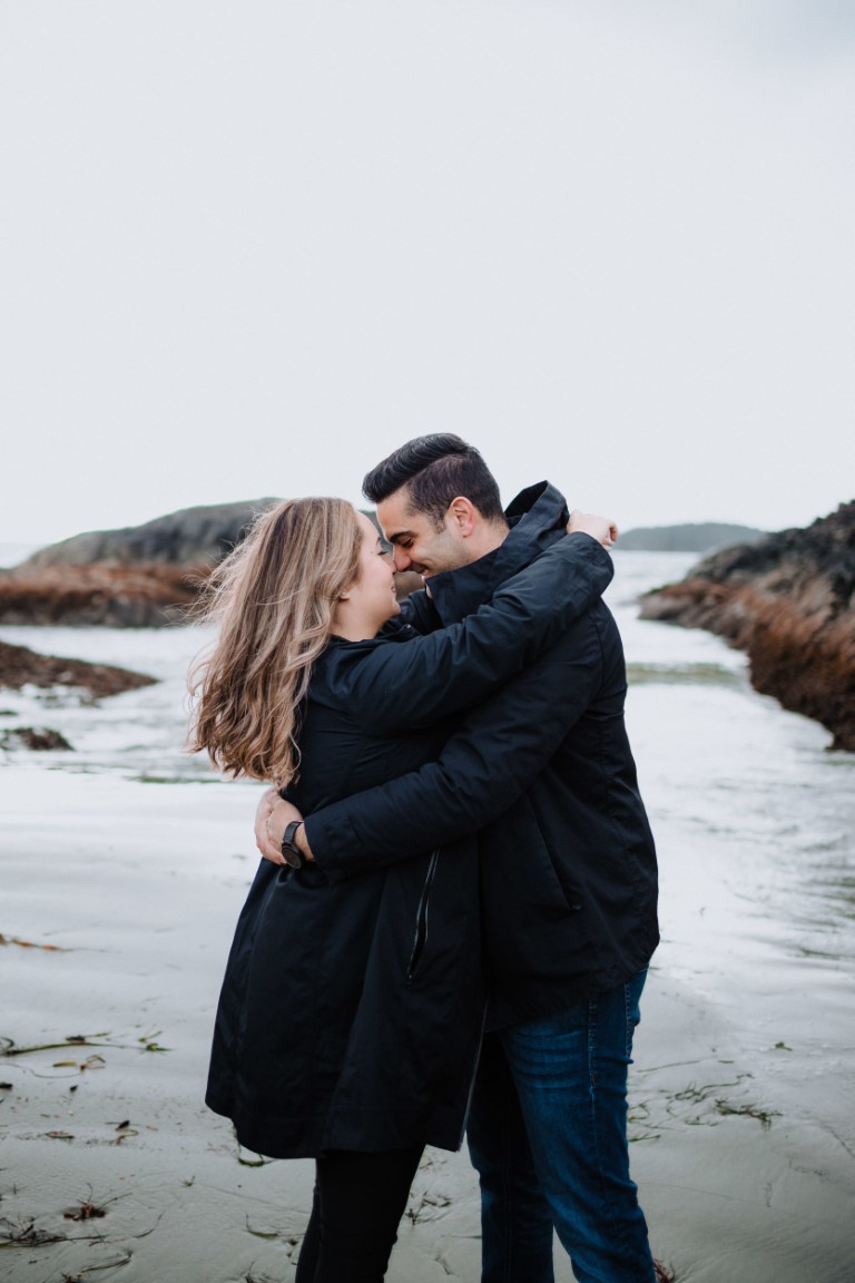 Newly engaged couple on Tofino beach