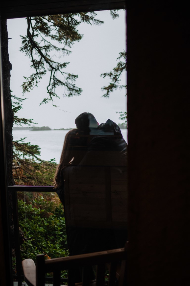 Engaged couple in Tofino shadows