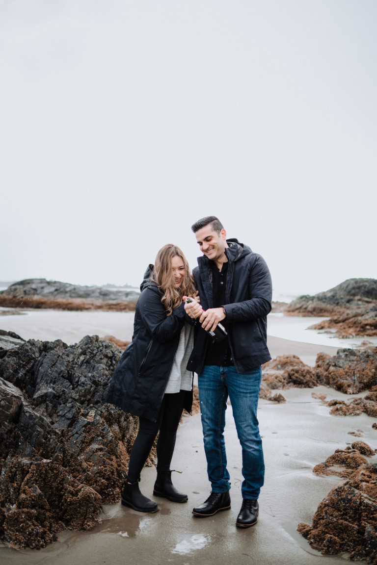 Engaged couple and champagne