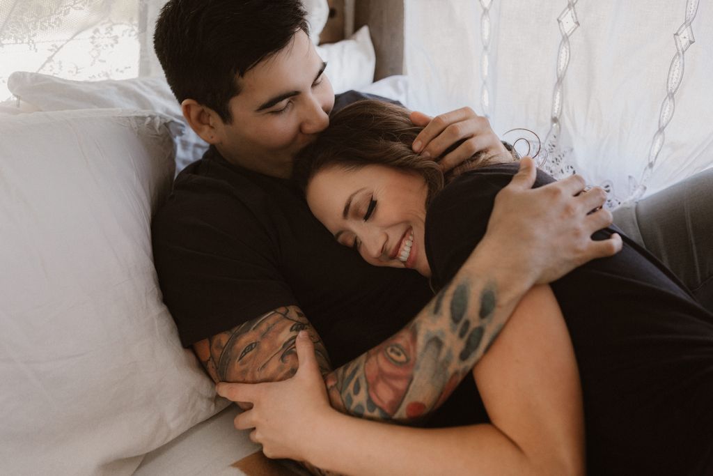 couple with tattoos in retro vintage trailer