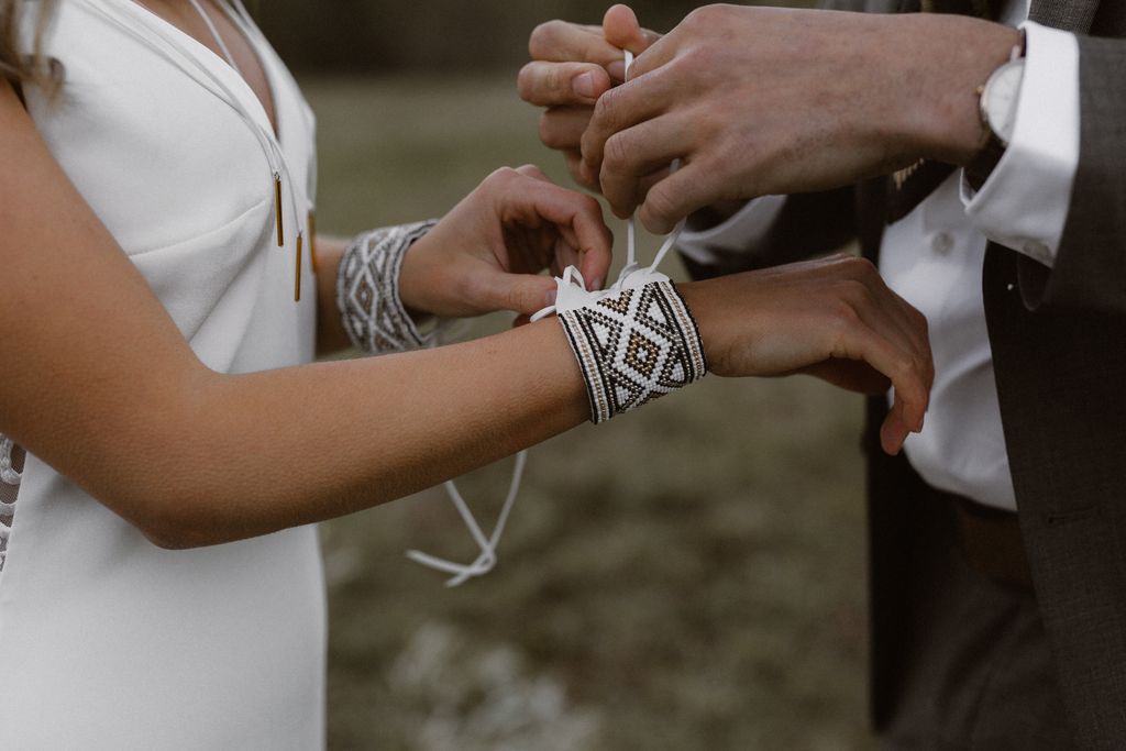 Cree ceremonial knot on wrist during wedding inspo