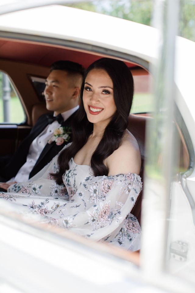 Newlyweds in vintage car