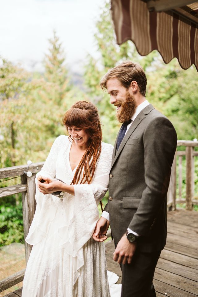 Bride admires her ring at ceremony