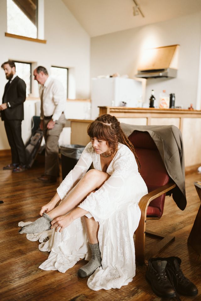 Bride puts on her shoes