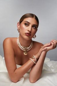 Bride wearing pearl chocker by Flux and Stone