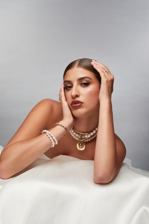 Bride with curated necklace by Flux and Stone