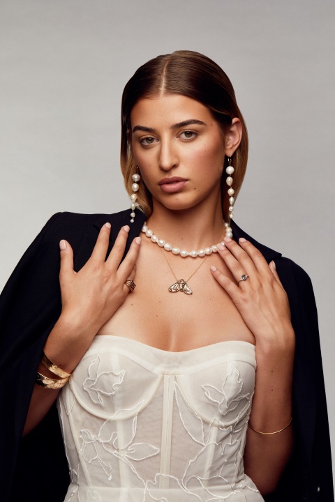 Bride in white corset and black leather jacket by Jennifer Richter 