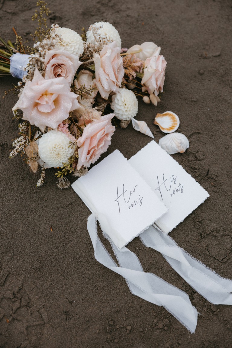 vow booklets with pink roses