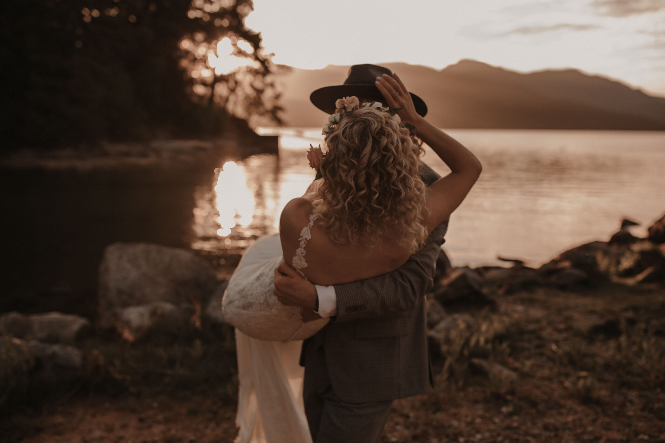 Eloping couple along the Sunshine Coast at sunset